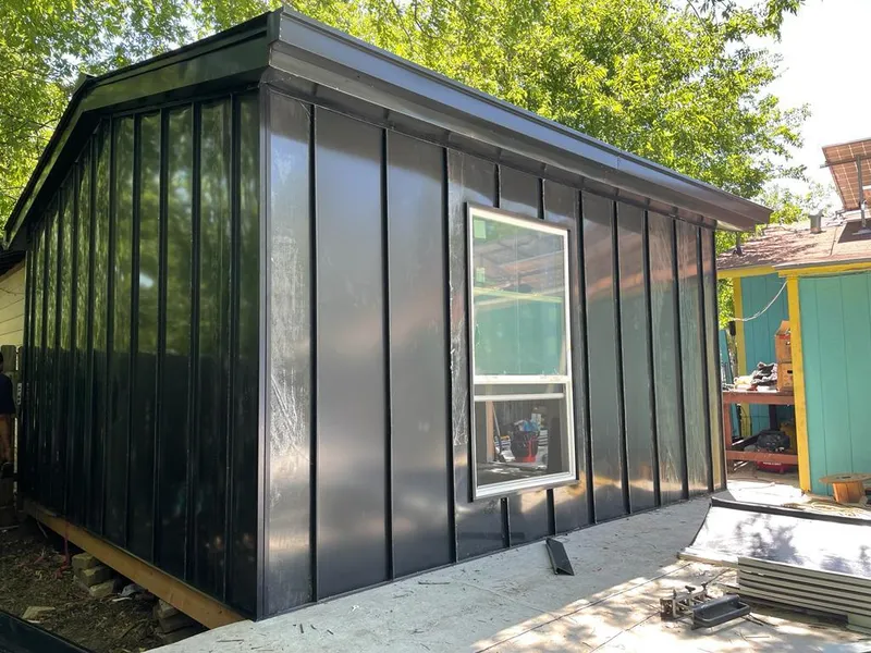 Black standing seam metal wall panels for Metal Roof Installation in Flat Rock