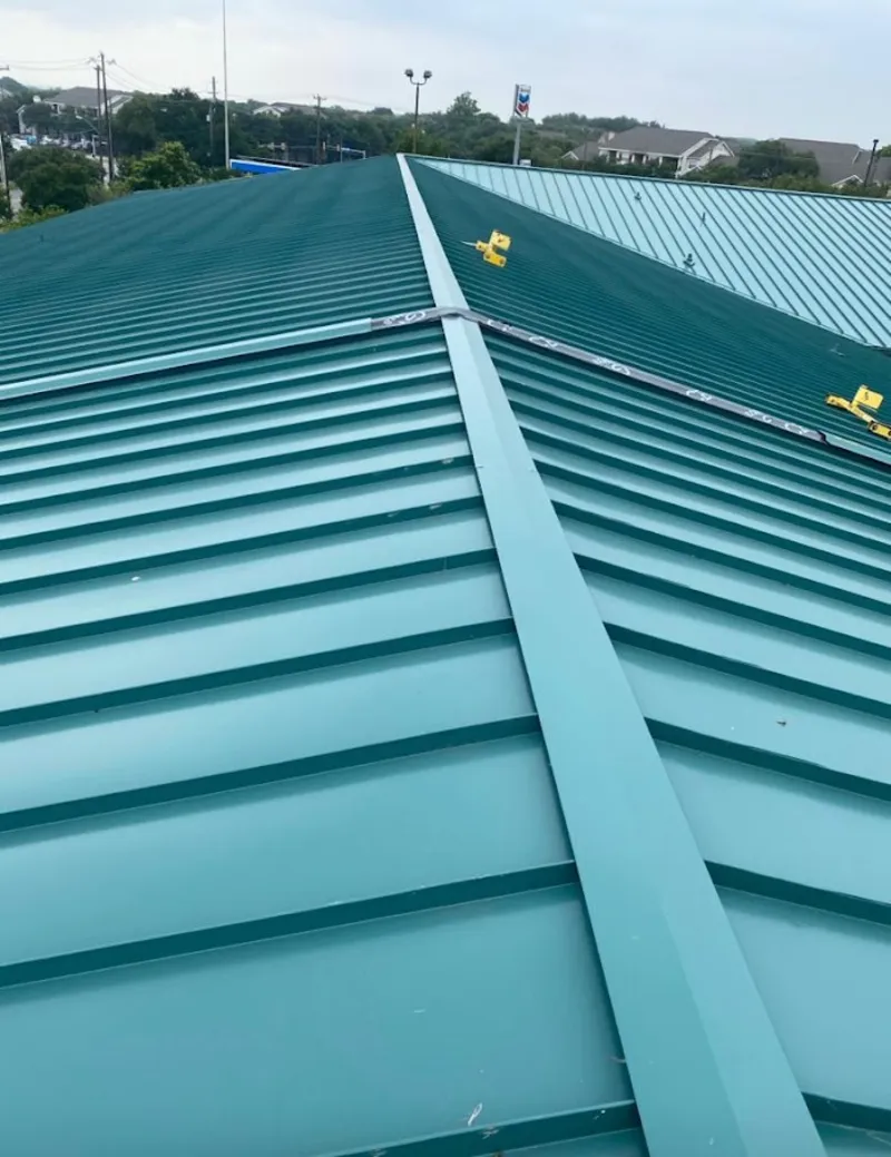 Green commercial metal roof ridge and valley for Metal Roof Repair in Flat Rock