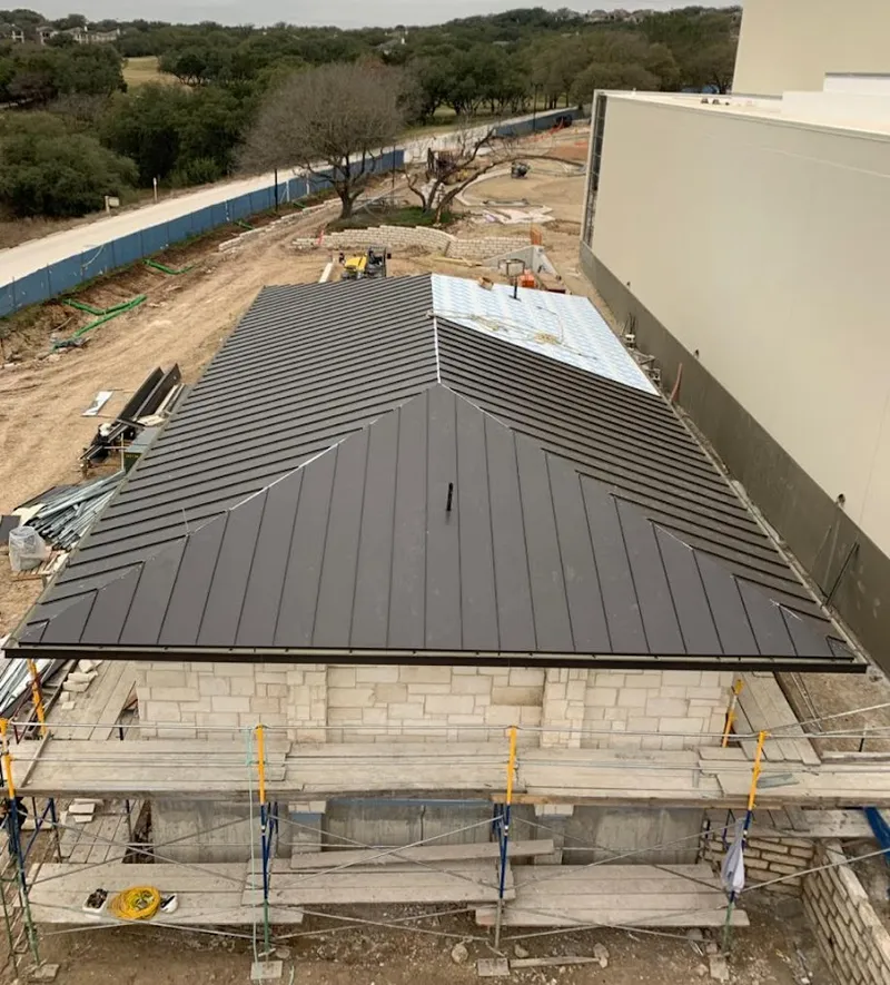 Metal roof new construction with scaffolding in Flat Rock