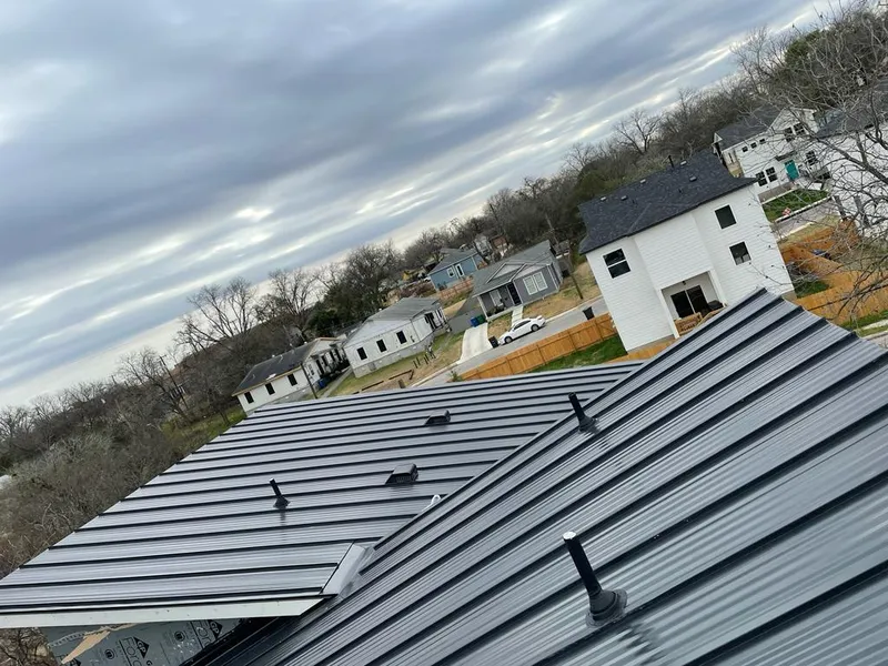 Standing seam metal roof panels with vents for Skylight Repair in Flat Rock